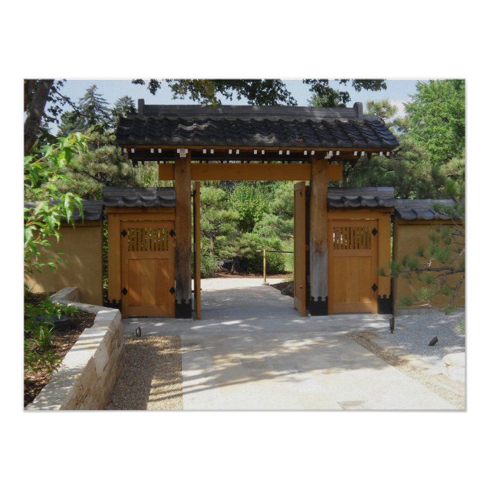 an outdoor area with two wooden doors and a stone walkway leading up to the entrance