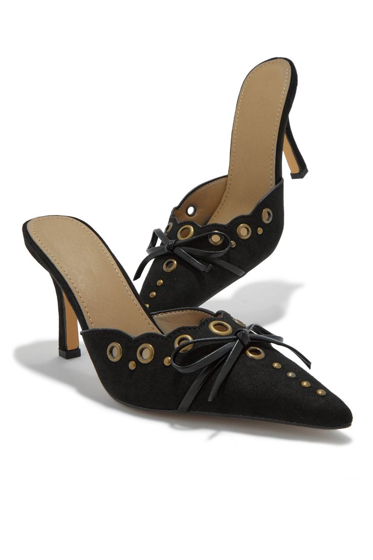 Jasmyn is the perfect combination of style and comfort. These black mules feature a pointed toe and slip-on entry for a timeless look. The studded detailing adds a bold touch. Unleash your inner fashionista with Jasmyn. Stock Unit: 12B2 SIZE & FIT Heel Height Approx: 3.25" Shoe Model Suggestion: True To Size  All m