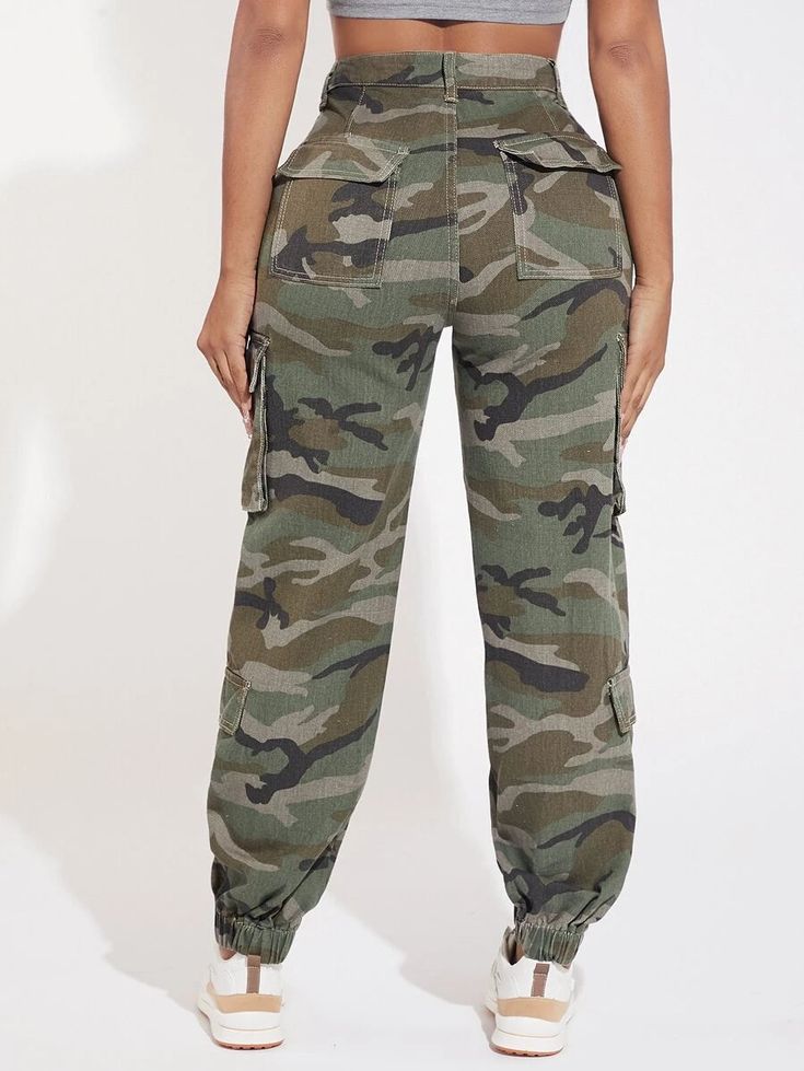 Gear up in style with our Camo Print Flap Pocket Side Cargo Jeans. These jeans feature a trendy camo print that adds a rugged and adventurous vibe to your outfit. The flap pockets on the sides offer a functional and fashionable element, allowing you to carry your essentials with ease. Details: Pattern Type: Camo Closure Type: Zipper Fly Details: Button, Pocket, Ring, Zipper Waist Line: Natural Length: Long Material: Denim Jeans Style: Cargo Pants Fabric: Non-Stretch Sheer: No Type: Jogger Fit Ty Casual Camouflage Cargo Pants With Patch Pockets, Camouflage Cotton Cargo Jeans, Trendy Camouflage Cotton Cargo Jeans, Khaki Cargo Jeans For Outdoor Activities, Casual Camouflage Cargo Jeans With Patch Pockets, Outdoor Camouflage Cargo Pants With Patch Pockets, Camouflage Cotton Cargo Jeans With Side Pockets, Camouflage Cargo Jeans For Streetwear In Fall, Fall Season Camouflage Cargo Jeans For Streetwear