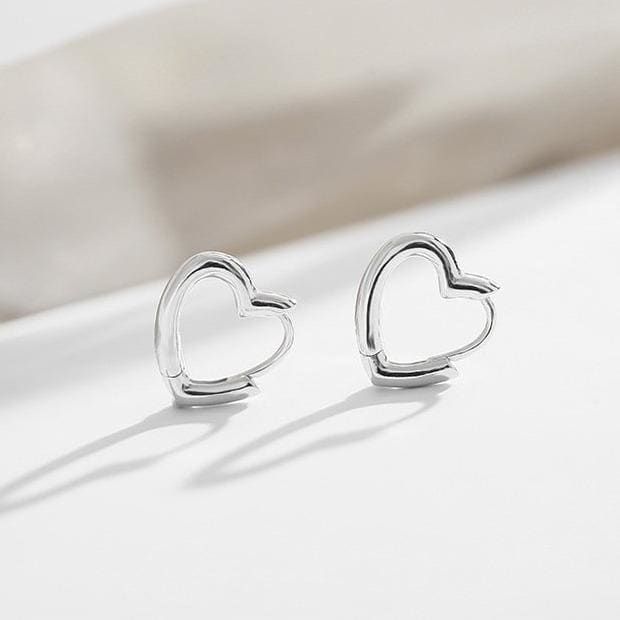 Metals Type: Tibetan silverShape\pattern: HeartGender: WomenFine or Fashion: FashionStyle: Casual/SportyMaterial: MetalMetals Type: 925 Silver Color Valentine's Day Minimalist Hoop Earrings, Trendy Silver Heart Hoop Earrings, Trendy Silver Heart Earrings For Valentine's Day, Silver Hoop Earrings For Valentine's Day, Minimalist Hoop Heart Earrings, Trendy Silver Hoop Earrings With Heart Charm, Sterling Silver Heart Hoop Earrings, Minimalist Silver Hoop Earrings For Valentine's Day, Heart Shaped Sterling Silver Hoop Earrings