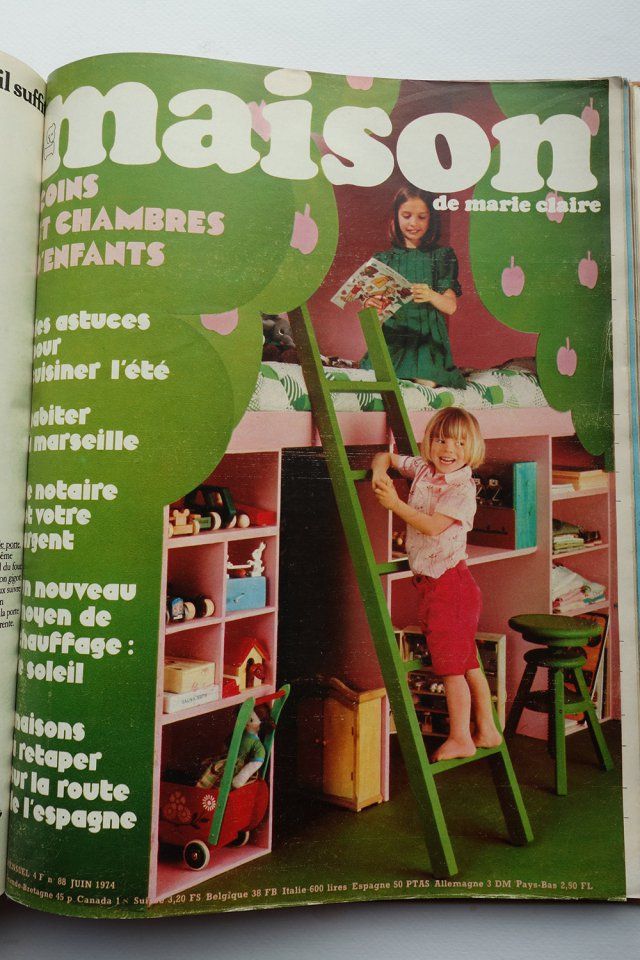 an open children's magazine with a child on the ladder