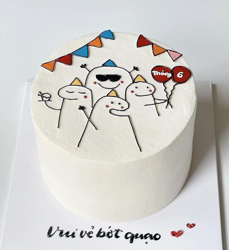 a white cake with an image of three people on it and the words i love you