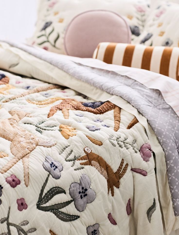 Nursery Decor Twin Bed Toddler Room, Fun Toddler Beds, Madeline Quilt, Anthropology Bedroom, Vintage Kids Bedroom, Kids Pattern Design, Rainbow Kids Bedroom, Boho Toddler Room, Sisters Bedroom Ideas