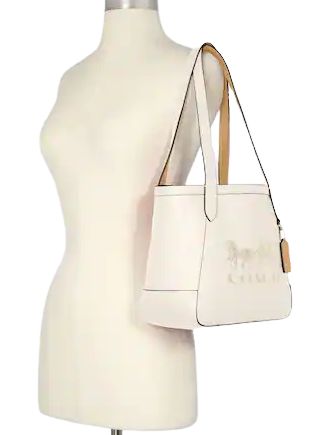 Pebble leatherInside zip pocketSnap closureHandles with 9 1/2" drop10 3/4" (L) x 9" (H) x 4 1/2" (W)Style No. C4062Color: Chalk Vanilla Cream Mexican Peso, New Taiwan Dollar, Horse And Carriage, Coach Tote, Gold Ounce, Vanilla Cream, Chalk, Vanilla, Cream