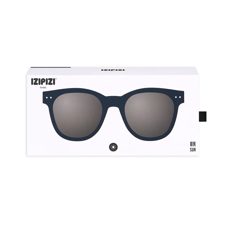 Featuring 100% UV protection and Category 3 lenses, these trapezoid oversized, stylish sunglasses offer incomparable defense from the sun's rays. With a chic and creative appearance, the soft arms and rubber texture provide unparalleled comfort and a feather-light feeling. Furthermore, the frame is expertly crafted with 45% organic polyamide derived from castor oil, making it an ecologically responsible option. Since 2010, IZIPIZI has charmed its patrons with a mesmerizing range of eyewear, artf Blue Polarized Plastic Shield Sunglasses, Trendy Blue Anti-reflective Shield Sunglasses, Blue Polarized Plastic Sunglasses, Oil Making, Luxury Blue Anti-reflective Shield Sunglasses, Rubber Texture, Outdoor Blue Anti-reflective Shield Sunglasses, Tortoise Color, Indigo Colour