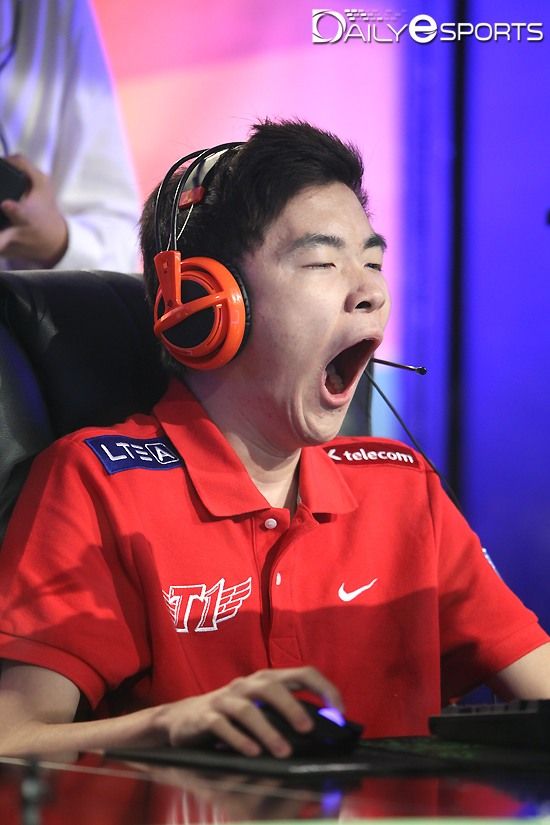 a young man wearing headphones is screaming