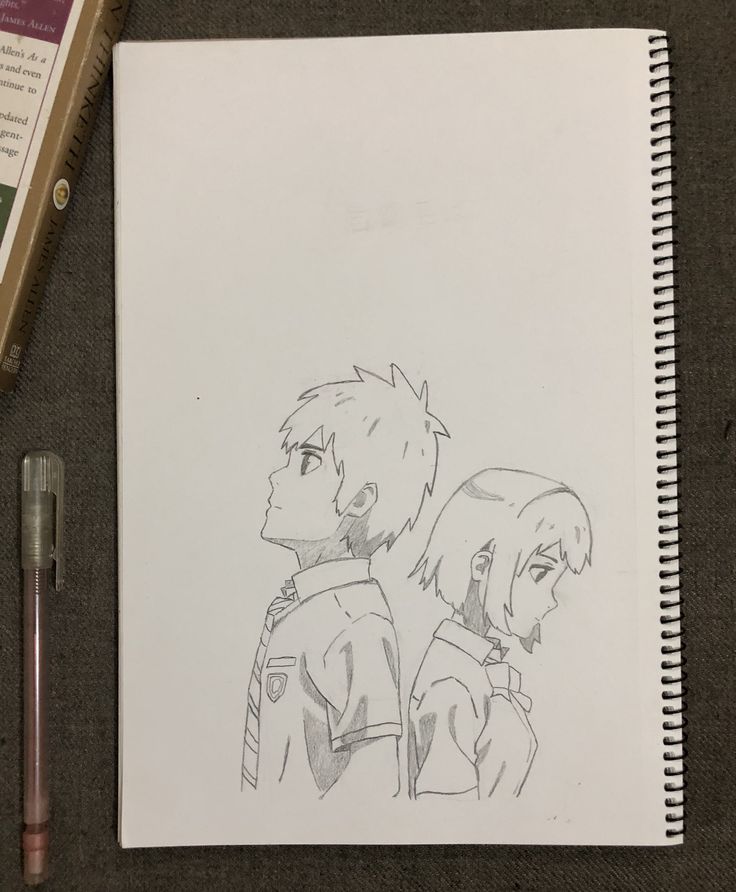 a drawing of two people next to a pen