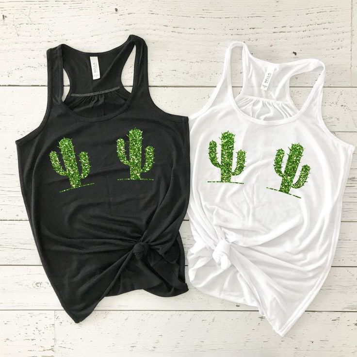 two women's tank tops with cactus designs on them, one in black and the other in white