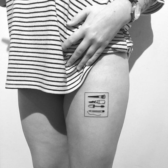 a woman's legs with a tattoo on her left thigh and the word love written in cursive writing