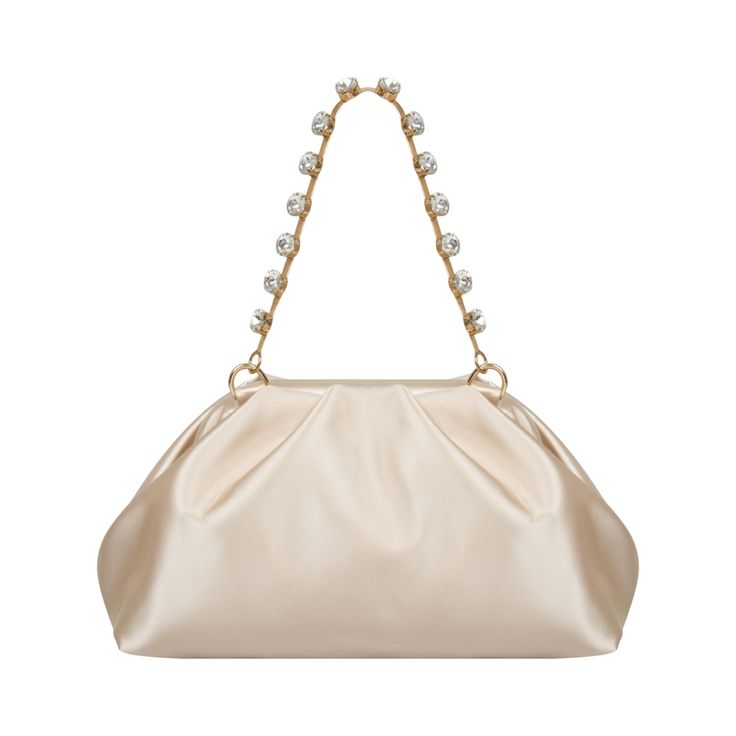 This elegant bag is crafted from satin with a vibrant beige color and features intricate twist detailing. Adorned with embroidered Swarovski stones on the handle, it adds a touch of luxury to your look. With dimensions of 23 cm in width, 8 cm in height, and 11 cm in length, it offers ample space for your essentials. Additionally, it comes with a dustbag for protection and convenience. Color: Beige Embroidered Swarovski stones on the handle Satin surface Twist detailing Comes with a dustbag  Dimensions: Width: 23 cm Height: 8 cm Length: 11 cm Elegant Top Handle Bag With Chain Strap, Cream Top Handle Bag For Party, Elegant Bags With Chain Strap And Top Handle, Cream Top Handle Party Bag, Luxury Beige Clutch With Detachable Handle, Cream Top Handle Party Bags, Party Cream Top Handle Bag, Embellished Cream Bags For Events, Evening Beige Shoulder Bag With Pearl Handle