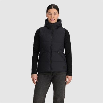 Lightweight and warm  with an extended length that makes it perfect for layering when the temp drops  the women's Outdoor Research Coze Hooded Down Vest will be your go-to everyday winter essential. Outdoor Research, Down Vest, Winter Essentials, Rei Co-op, Outdoor Woman, Womens Vest, Layering, Clothes For Women, Clothes