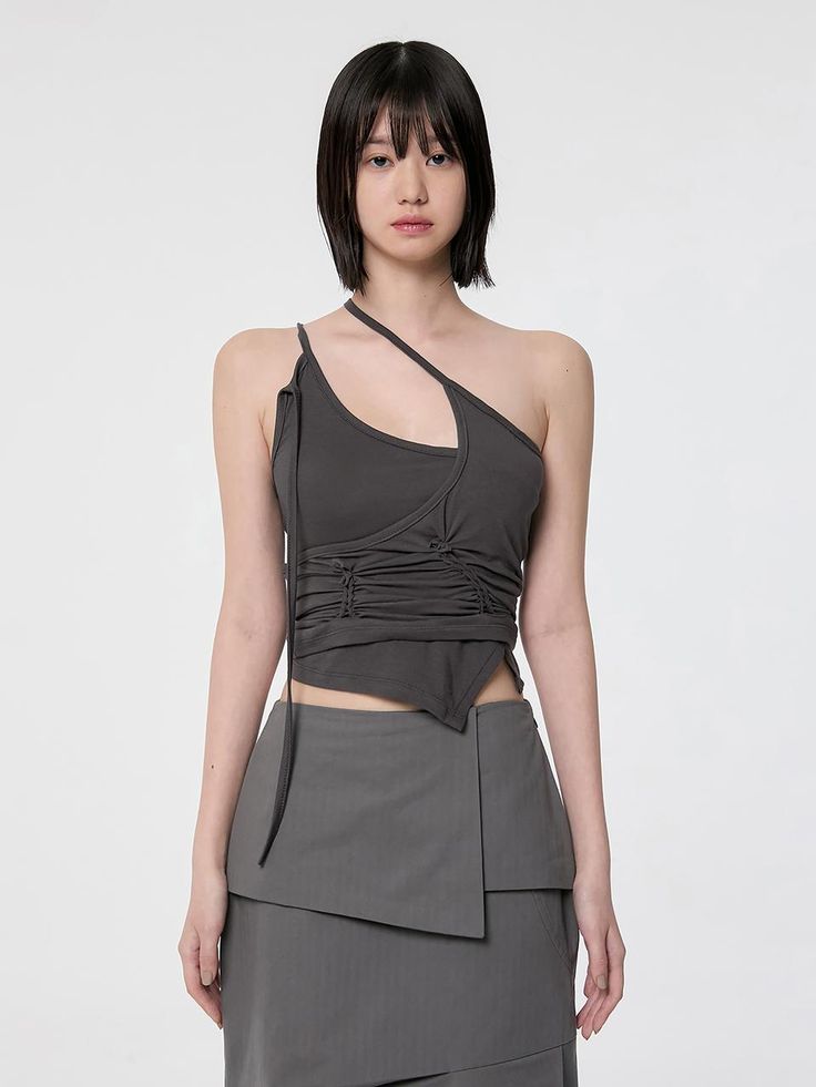 This is a trendy and feminine top set by FLARE UP that is made out of high quality and sturdy material. With distinctive mood of the design and comfortable wear, you can style it for your casual daily outfit.- Inner and outer top layered- Hand braided detail- Soft touch of elastic fabric- Trendy and feminine mood Chic Fitted Gray Crop Top, Fitted Asymmetrical Gray Top, Gray Fitted Asymmetrical Top, Fitted Gray Asymmetrical Top, Chic Gray Spring Crop Top, Trendy Gray Top For Night Out, Chic Gray Crop Top For Spring, Edgy Fitted Gray Tops, Gray Fitted Edgy Tops