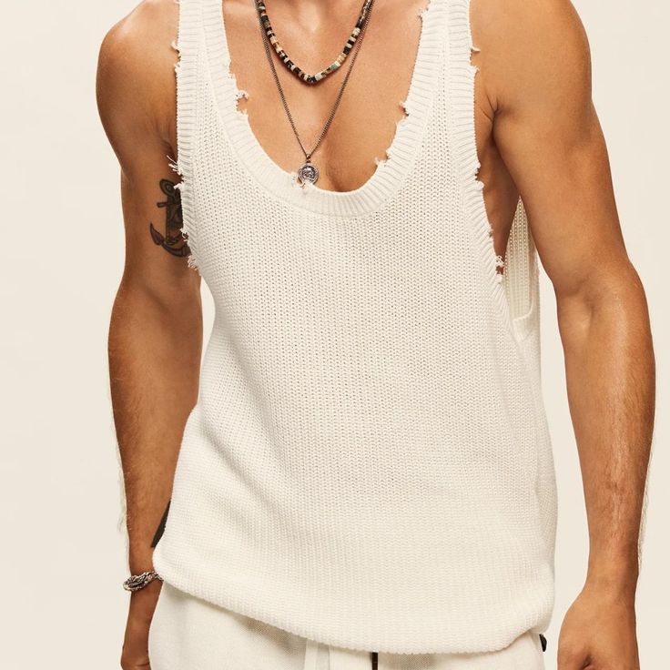 Ribbed-Knit Cotton Tank. Subtle Distressing On Edges. Cut For Loose Fit. Shown Here In White. Length 28.5 Chest 15 100% Cotton Made In China New Been Worn, The Pictures In Yellow Are The Actual Tank. Summer Cotton Ribbed Sweater Vest, Sleeveless Knit Tops With Relaxed Fit, Ribbed Crew Neck Sweater Vest For Summer, White Knitted Tops With Relaxed Fit, Casual White Open Knit Sweater Vest, White Crew Neck Sweater Vest For Summer, Casual Open Knit Crew Neck Tank Top, Sleeveless Open Knit Cotton Sweater, Summer Knit Sweater Vest With Crew Neck