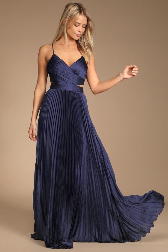 It will be clear just how glamorous you are in the Lulus Got the Glam Navy Blue Pleated Cutout Maxi Dress! Sleek woven satin shapes this dress that has adjustable spaghetti straps, a surplice neckline, and a fitted bodice. A back cutout peeks around to the sides atop a banded waist and an accordion-pleated maxi skirt. Exposed silver zipper on the top and hidden back zipper/clasp on the skirt. Fit: This garment fits true to size. Length: Floor length. Size medium measures 57.5" from adjustable st Navy Blue Maxi Dress, Cutout Maxi Dress, Pleated Maxi Dress, Maxi Dress Formal, Satin Maxi Dress, Formal Dresses For Women, Lulu Dresses, Maxi Dress Blue, Cutout Dress