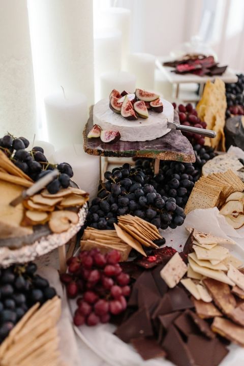 a table topped with lots of different types of food