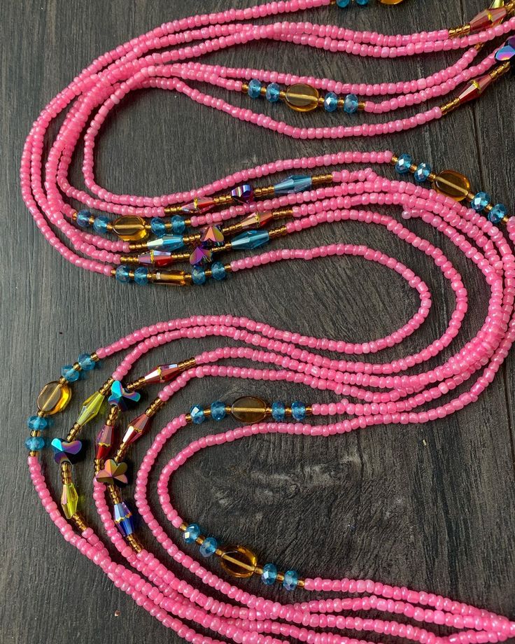 These beads come in TIE ON only, they are 45"- 52" long and self adjustable based on your waist size. ★ Please note, the Bead option you pick is exactly what you'll receive. ★ The listed prices are for one strand each. For multiple strands you'll have to indicate from the quantity section in your cart. Uses of Waist beads ★ Cultural and Spiritual Reasons ★Waist beads as ornaments as well as for symbolic adornment, ★ which serves as a sign of wealth, femininity or aristocracy, as well as spiritua Adjustable Round Waist Beads As Gift, Adjustable Bohemian Waist Beads With Tiny Beads, Adjustable Tiny Beads Waist Beads As Gift, Adjustable Beaded Waist Beads As Gift, Adjustable Spiritual Waist Beads With Faceted Beads, Spiritual Adjustable Waist Beads With Faceted Beads, Adjustable Spiritual Waist Beads, Adjustable Spiritual Waist Beads For Festival, Pink Waist Beads With 108 Beads As A Gift