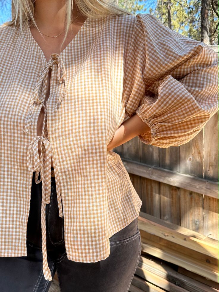 Our cutest new puff sleeve tie top is here! It's an oversized top and I wanted to create this to wear over the french top, over tank tops, sleeveless dresses, etc. It's a perfect addition to the Honeydove line. I made ours with organic cotton/linen blend. I chose this blended fabric because when linen is blended with cotton it wrinkles less, which is such a win!! Note that the honey color will be matching with upcoming children's pinafore dresses and bonnets if that is important to you :) These French Top, Brown Gingham, Honey Color, Sleeveless Dresses, Honey Colour, Pinafore Dress, Oversized Top, Tie Top, Raw Silk