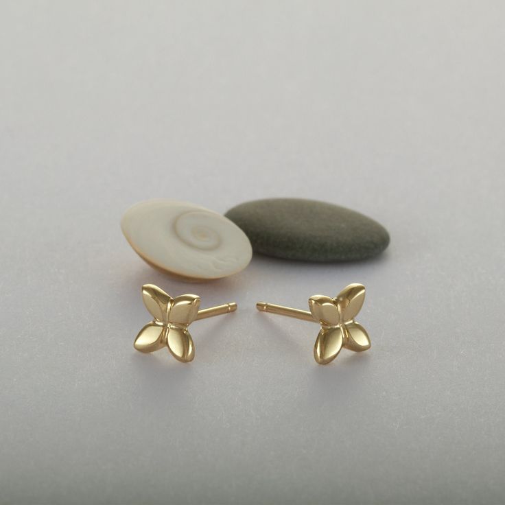 These are flower stud earrings, handmade of yellow 14k solid gold.  Their finish is shiny, and they are comfortable to wear. Small and dainty, these unique gold studs are perfect for everyday's wear.  Great as a gift as they can be enjoyed at any age and outfit. 14k solid gold ear backs are included. Size of the earrings is 5.3 x 5.8 mm = approx. 0.2 x 0.22 inch * The earrings will be packed in a gift box ready to give as a gift, and shipped via Express mail service which usually takes 4-6 busin Gold Flower Stud Earrings, Yellow Gold Flower Shape Cluster Earrings For Gift, Yellow Gold Flower Cluster Earrings Gift, Yellow Gold Hallmarked Flower Earrings For Gift, 14k Yellow Gold Cluster Earrings Gift, Real Gold Earrings, Unique Stud Earrings, Stud Earrings Unique, Studs Gold