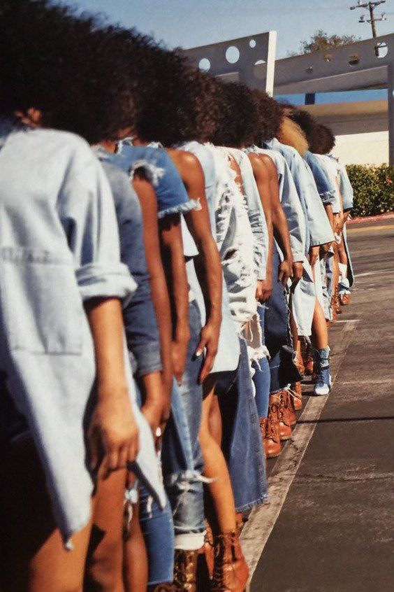 a group of women standing next to each other