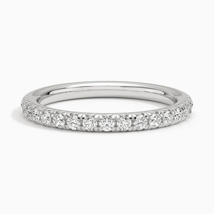 a white gold wedding band with round diamonds