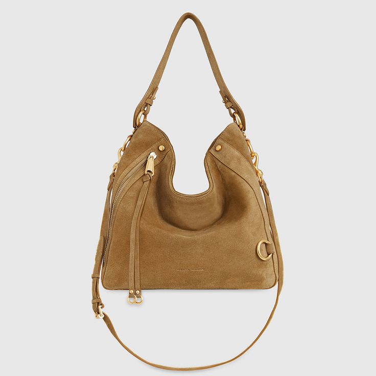 Crafted in supple suede leather and accented with antique brass hardware, the new M. A. B. Hobo Bag is spacious enough for your laptop and then some. Plus, the adjustable shoulder strap can be worn as a crossbody, so it will lighten the weight you’re carrying. Style #:HS24TSUHOB 100% Suede Leather Antique Bass Hardware 11" W X 11" H X 6. 5" D Detachable Strap: Strap Drop 17. | Rebecca Minkoff M.A.B. Hobo Bag In Honey Leather Outerwear, Womens Designer Handbags, Antique Brass Hardware, Large Shoulder Bags, Shoe Size Conversion, Leather Shops, Pocket Bag, Leather Hobo, Brass Hardware