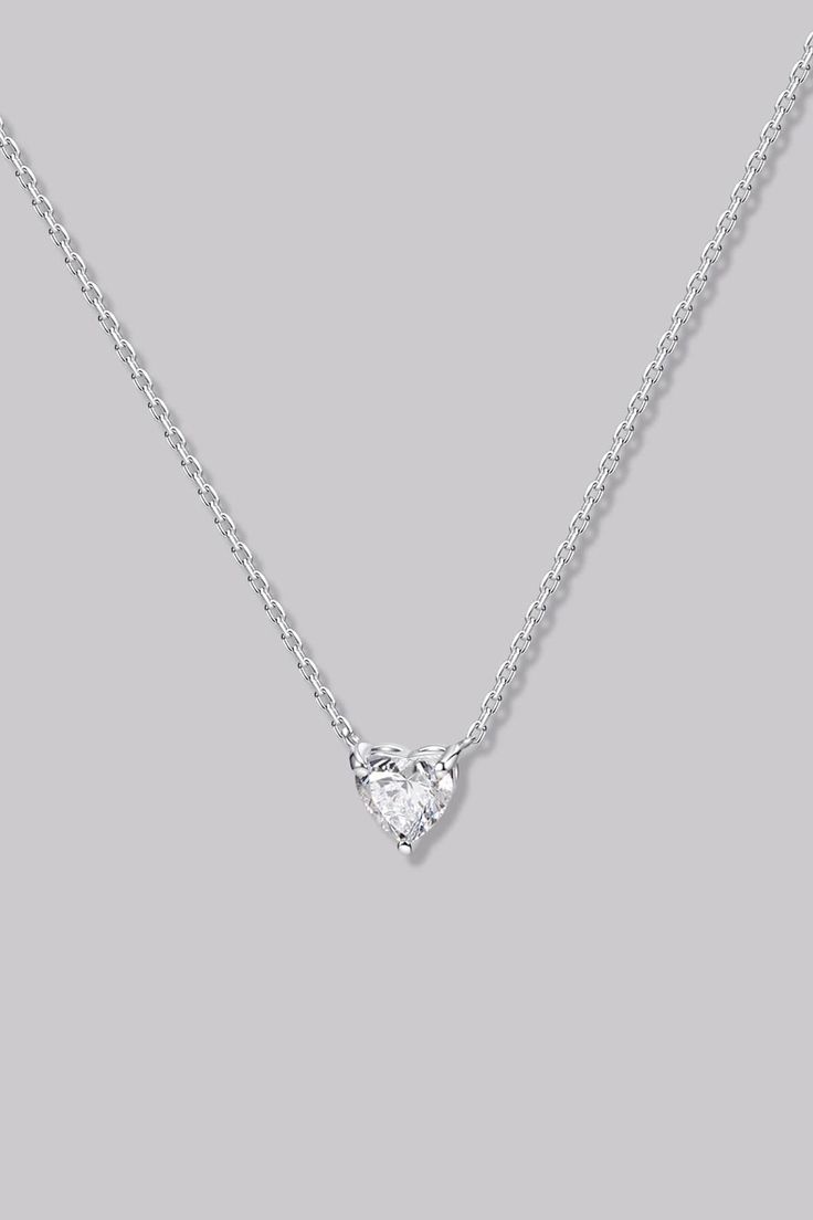 Solitaire Heart Diamond Necklace (0.34ct) - APM Monaco Refined White Gold Solitaire Necklace For Anniversary, Heart Cut Single Diamond Platinum Jewelry, Formal Heart Cut Diamond Necklace, Classic Diamond Cut Necklace For Valentine's Day, Elegant Heart Shaped Diamond Necklace For Formal, White Heart-shaped Diamond Necklace For Formal Events, White Heart-shaped Diamond Necklace For Formal Occasions, Elegant Heart Shaped Diamond Necklace For Formal Occasions, Classic Single Cut Diamond Necklace For Valentine's Day