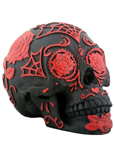 a black and red skull with roses on it