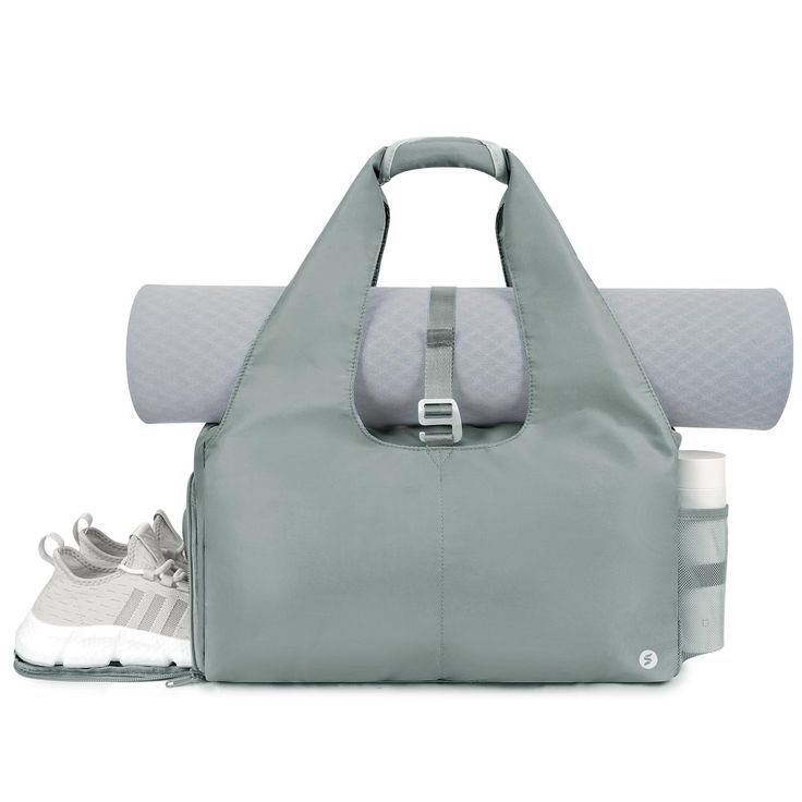 a gray bag and some white shoes