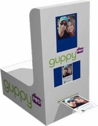 a white box with two pictures on the front and one in the back that says guppy