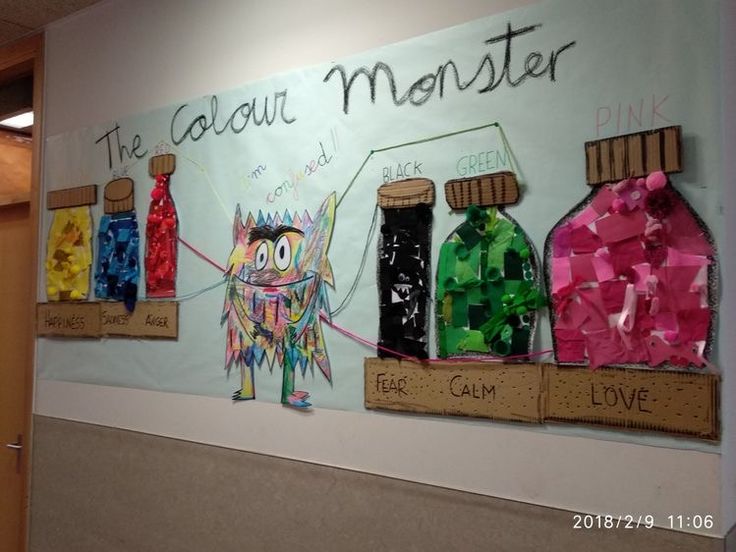 a wall with some paintings on it that says the colours monster and three little bottles