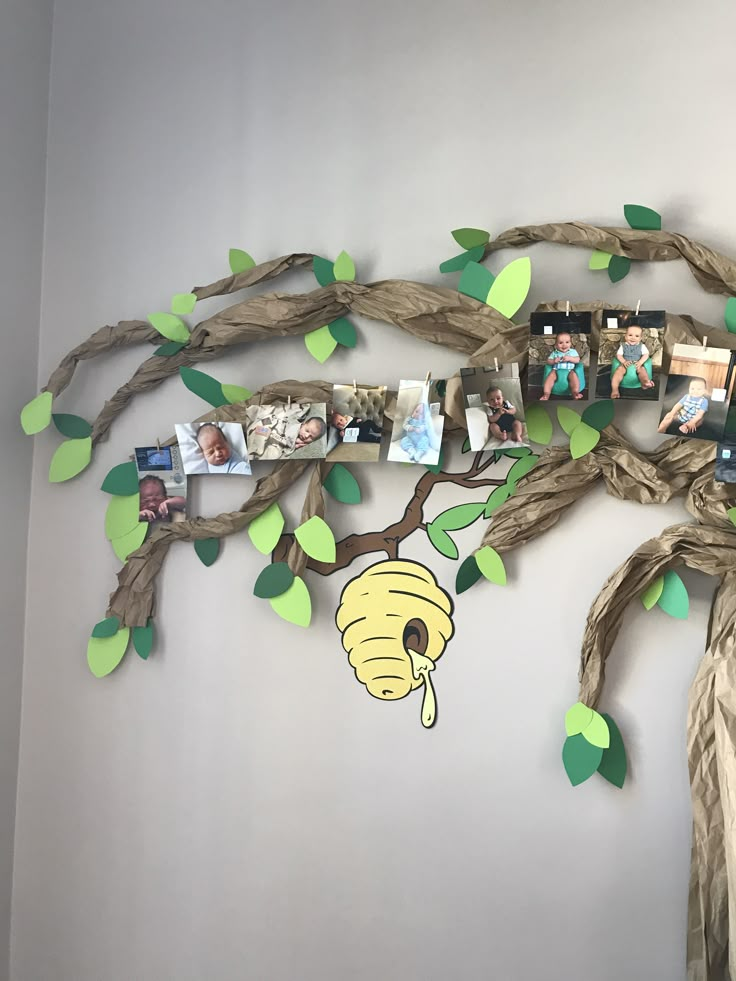 a family tree with pictures and leaves on it