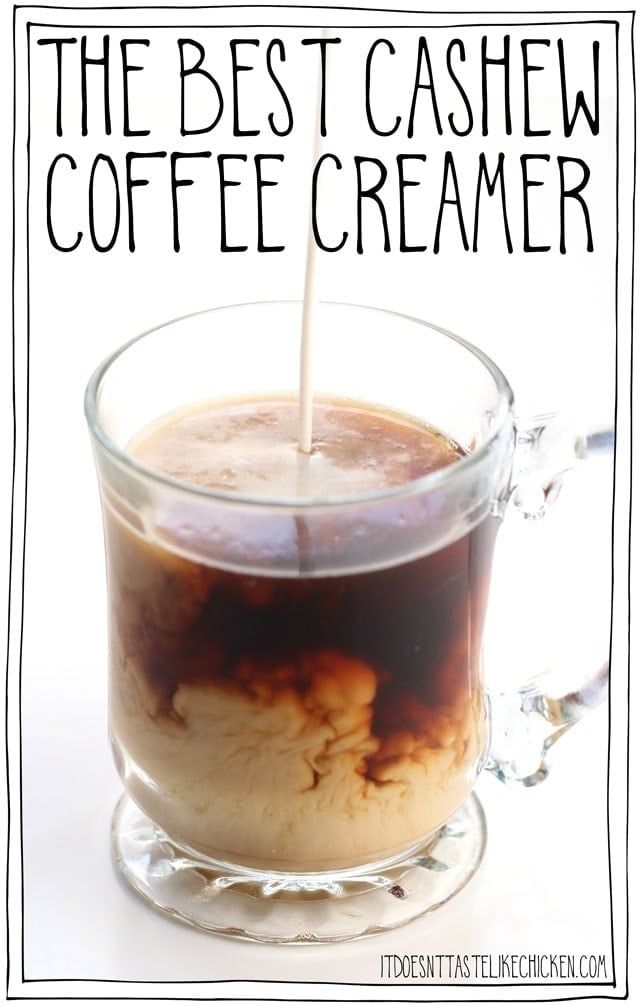 the best cashew coffee creamer is in a glass mug with liquid pouring into it