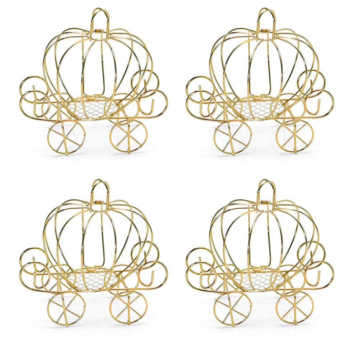 four golden metal pumpkins sitting on top of each other in the shape of a carriage