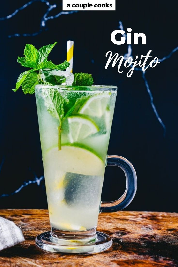 a gin mojito with lime and mint garnish