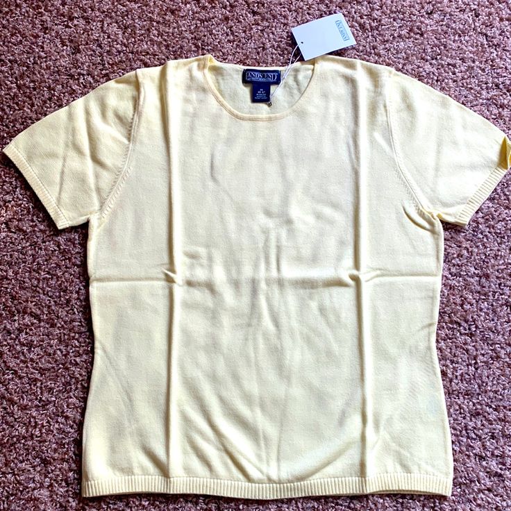 Lands End Short Sleeved Knit Top In Lemon Yellow, Size Medium. In Original Plastic Packaging. Classic Knit Tops For Spring, Classic Stretch Knit Top For Summer, Classic Crew Neck Summer Sweater, Yellow Short Sleeve T-shirt For Beach, Yellow Embroidered Short Sleeve T-shirt, Cheap Yellow Short Sleeve T-shirt, Vintage Yellow Short Sleeve T-shirt, Velour Hoodie, Yellow Moisture-wicking Short Sleeve T-shirt