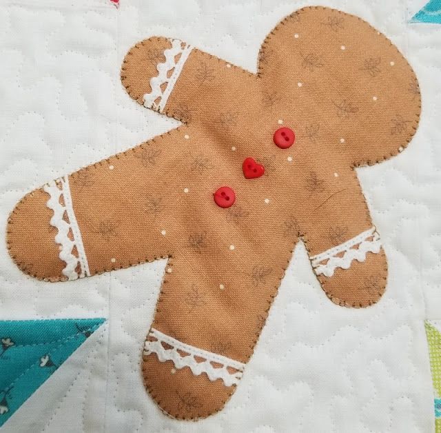 a close up of a piece of fabric with a ginger on it