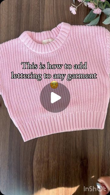 a pink sweater with the words, this is how to add lettering to any garment