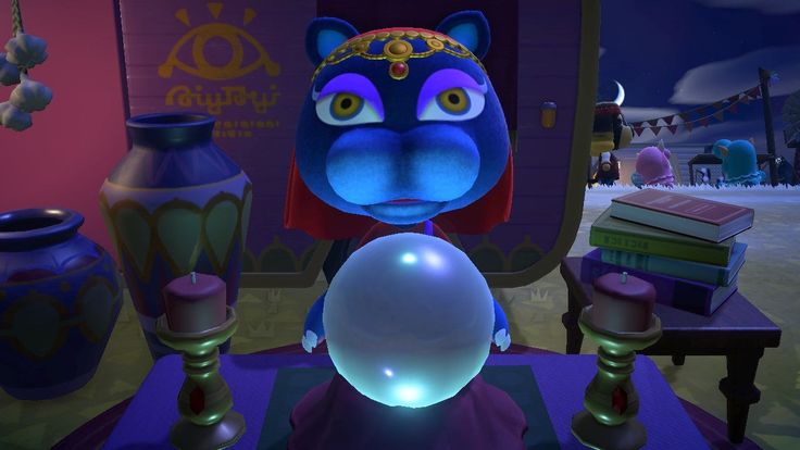 an animated character is looking at a crystal ball in front of him and other items