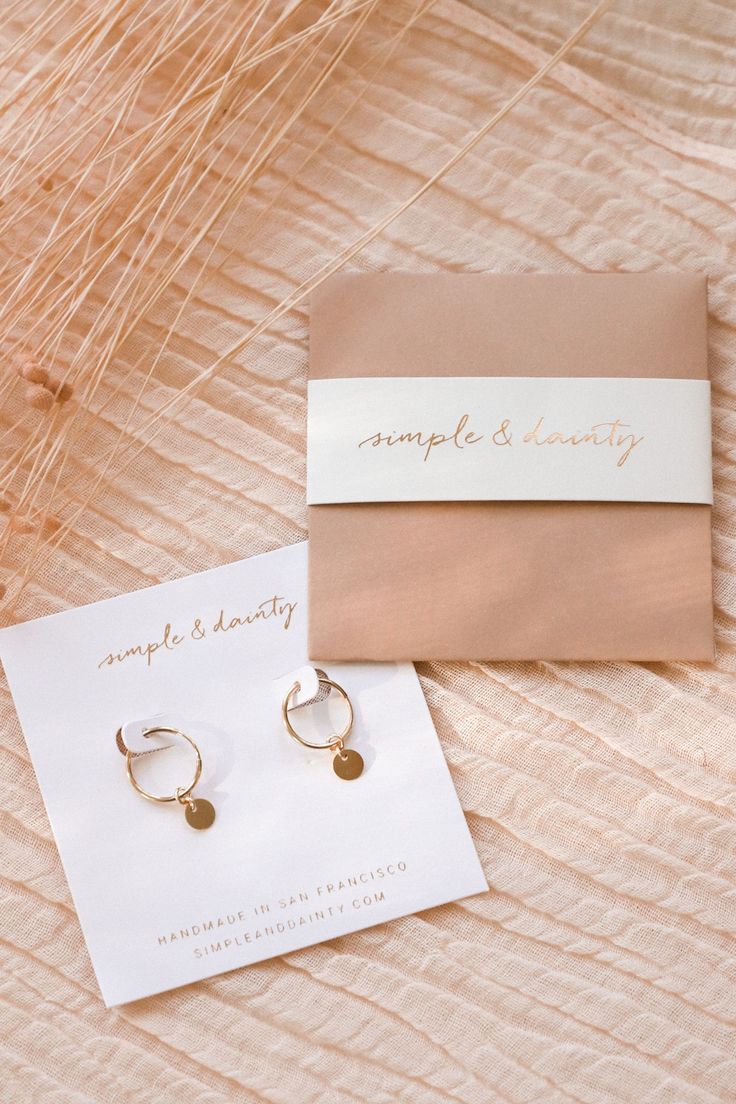 Our Tiny Coin Hoops are perfect, simple earrings that go well with just about everything! They'll add a fun dangle and shine to your look. They're perfect for everyday wear, as they're made of gold fill or sterling silver - materials durable for daily use!  The best part is that they don't tarnish... and they're affordable! Find more at Simple & Dainty. Photo credit: https://www.instagram.com/helloimaubs/ Nickel-free Small Hoop Earrings In 14k Gold Filled, Hypoallergenic 14k Gold Filled Dangle Huggie Earrings, Dainty Nickel-free Huggie Earrings For Everyday, Everyday Nickel-free 14k Gold Huggie Earrings, Personalized Yellow Gold Earrings For Everyday Wear, Personalized 14k Gold Earrings For Everyday, Simple Gold Huggie Jewelry, Everyday 14k Gold Filled Nickel Free Huggie Earrings, Silver 14k Gold Filled Huggie Earrings For Gifts