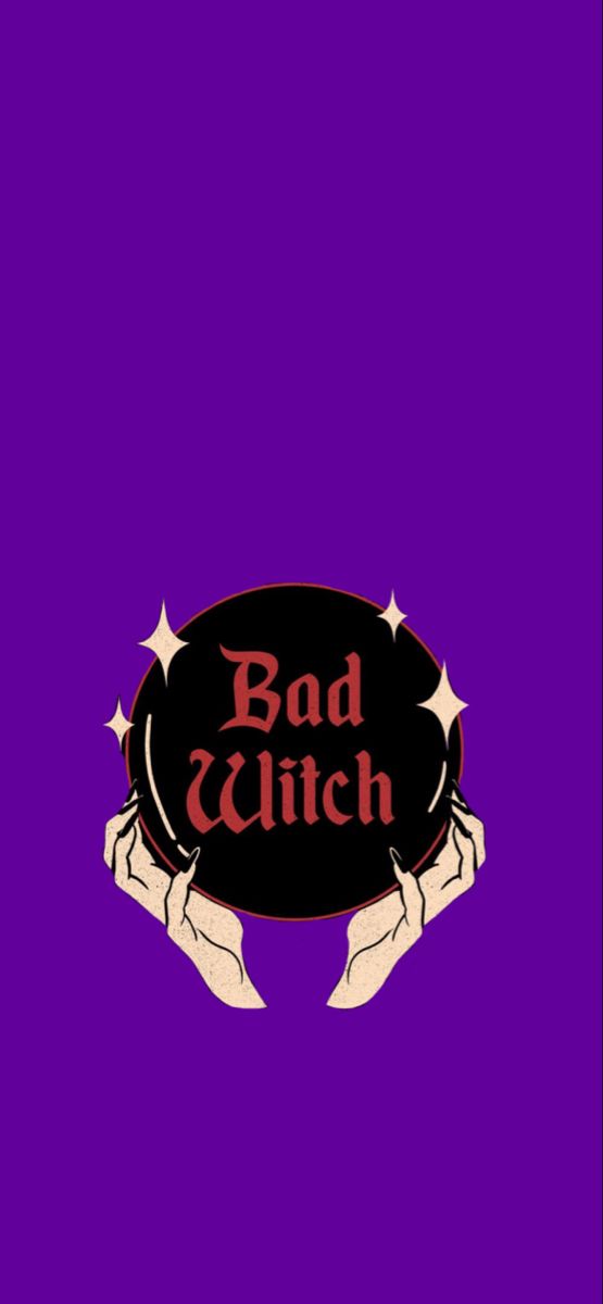 two hands holding a sign that says bad witch