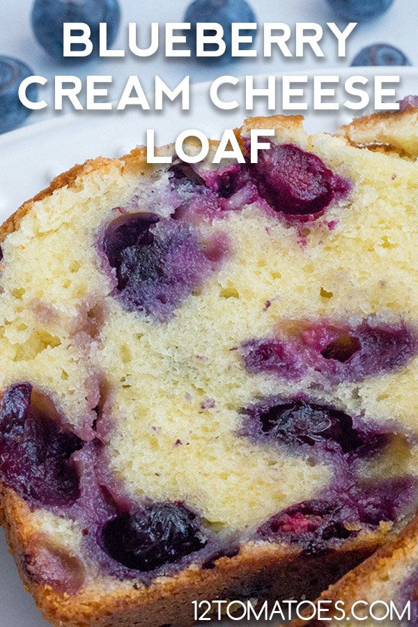 blueberry cream cheese loaf on a white plate