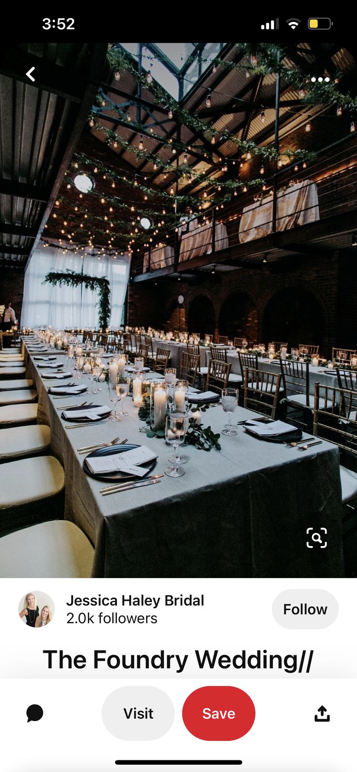 the table is set up with candles and place settings for guests to sit down at