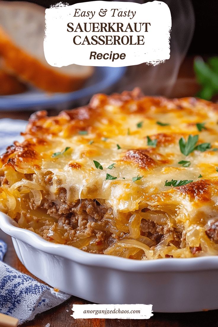 a casserole with meat and cheese in a white dish on a wooden table