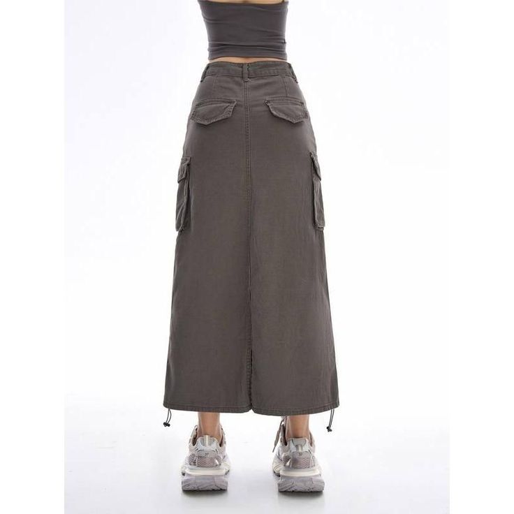 Introducing Our Latest Arrival Elevate your summer wardrobe with our New Cargo Long Skirt – a perfect blend of comfort, style, and versatility. This casual drawstring skirt with pockets is designed for the modern woman who values both fashion and functionality. Key Features Empire Waistline for a flattering fit Mid-Calf Length – the ideal balance of modesty and trendiness No-Nonsense Decoration – embrace simplicity with a clean look A-Line Silhouette for a graceful and timeless appeal Solid Pattern Type – a wardrobe staple that pairs effortlessly Crafted from a blend of Cotton and Polyester for ultimate comfort Non-Stretch Elasticity for a structured and reliable fit Regular Fit – providing comfort without compromising style When to Wear This high-waisted skirt is your go-to choice for cas Cotton Maxi Skirt With Drawstring And Relaxed Fit, Cotton Maxi Skirt With Drawstring, Utility Cotton Cargo Skirt, Casual Mini Cargo Skirt With Elastic Waistband, Utility Style Relaxed Skirt For Spring, Summer Cargo Skirt With Elastic Waistband And Relaxed Fit, Relaxed Utility Skirt For Spring, Relaxed Cargo Skirt With Elastic Waistband For Summer, Summer Cargo Skirt With Elastic Waistband