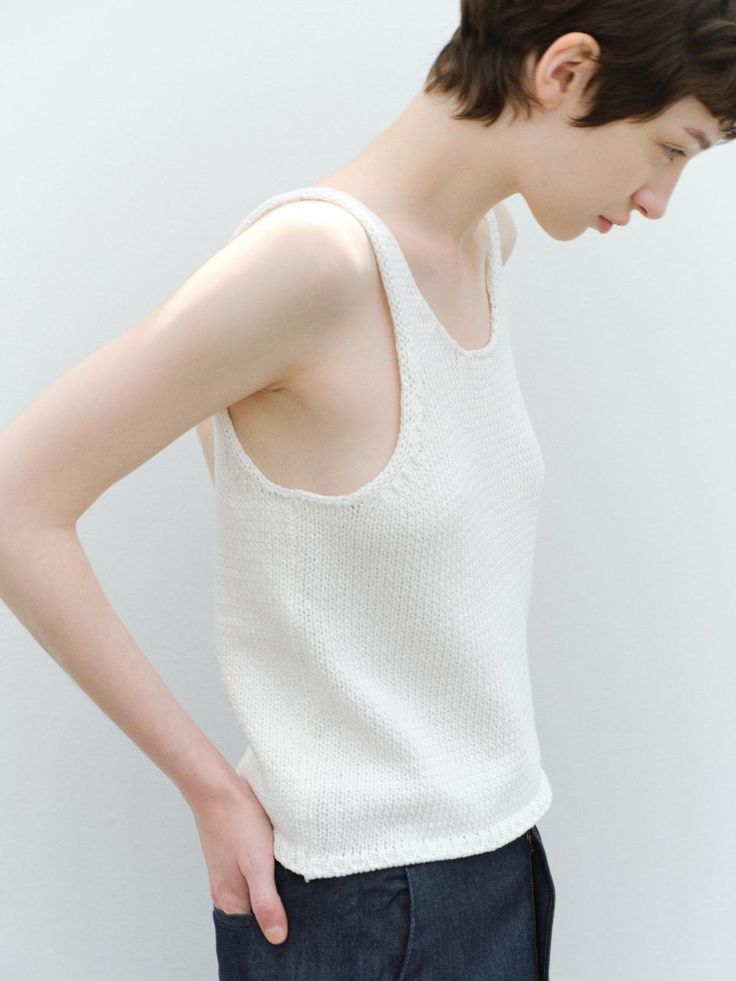 Composition : cotton 100Color : whiteCountry of Origin : KOREA Fitted Cotton Tank Knit Top, Fitted Cotton Chic Sweater Vest, Fitted Cotton Tank Sweater Vest, Chic Fitted Cotton Sweater Vest, Fitted Knit Cotton Tank Top, Fitted Cotton Knit Tank Top, Stretch Cotton Sleeveless Sweater Vest, Fitted Cotton Knit Top, Everyday White Cotton Vest