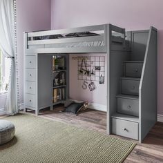 a loft bed with stairs and storage underneath