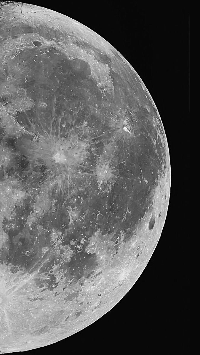 the full moon is shown in black and white