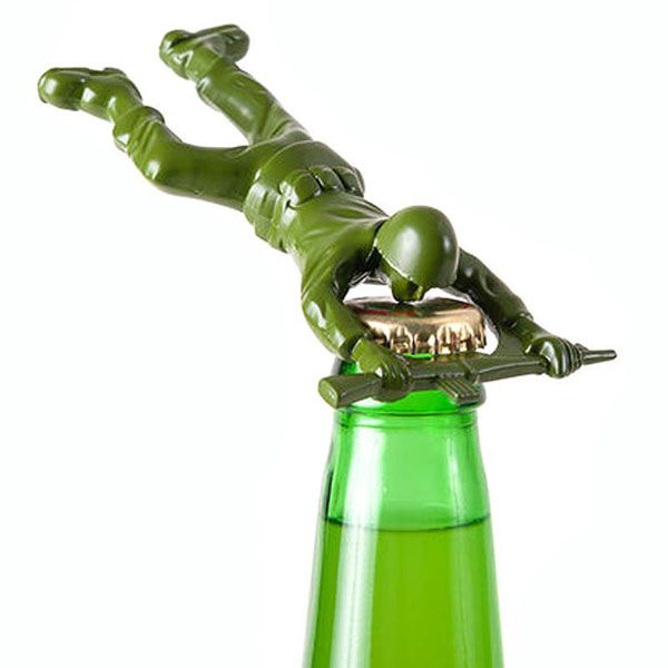 a green glass bottle with an alligator in it