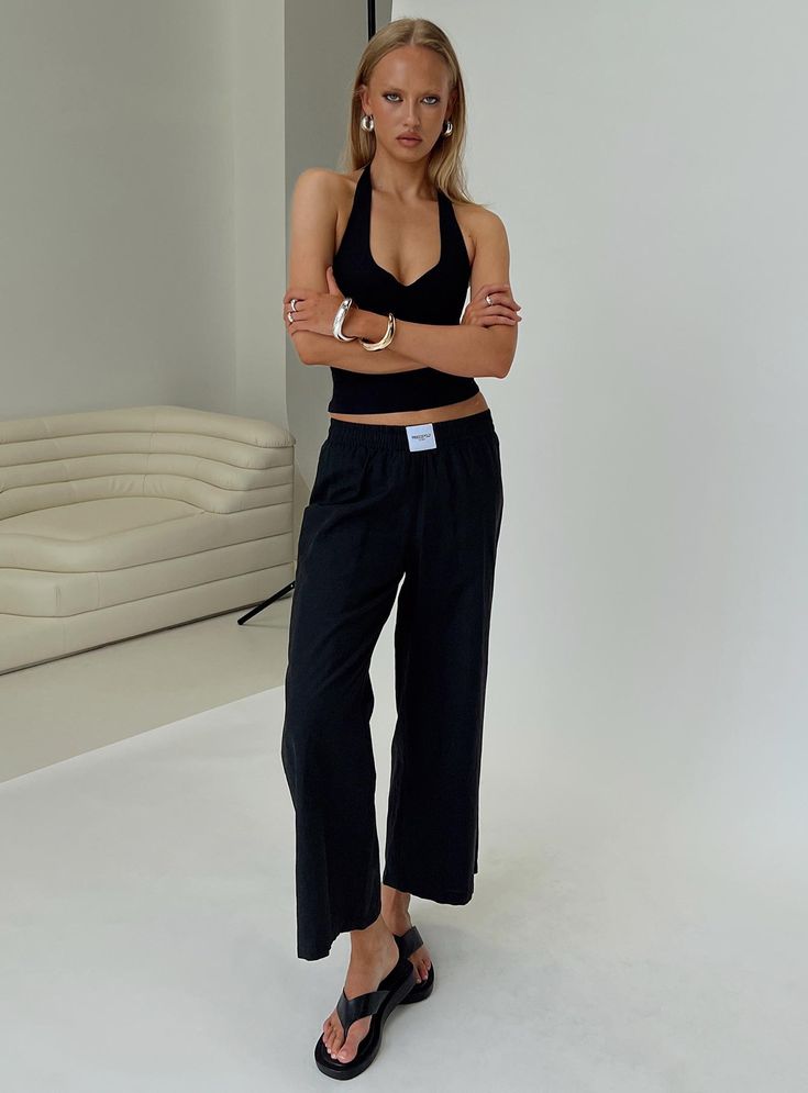 Pants Elasticated waistband, inner drawstring fastening, twin pockets at back, branded patch at front, straight leg, relaxed fit Non-stretch material, unlined 65% cotton 35% polyester Cold gentle machine wash Relaxed Bottoms With Elastic Waistband And Straight Hem, Black Pants With Straight Hem For Loungewear, Stretch Straight Leg Lounging Pants, Casual Elastane Bottoms For Lounging, Straight Leg Stretch Pants For Lounging, Stretch Straight Leg Pants For Lounging, Chic Loungewear Bottoms With Straight Hem, Black Loungewear Pants With Straight Hem, Chic Cotton Parachute Pants For Loungewear