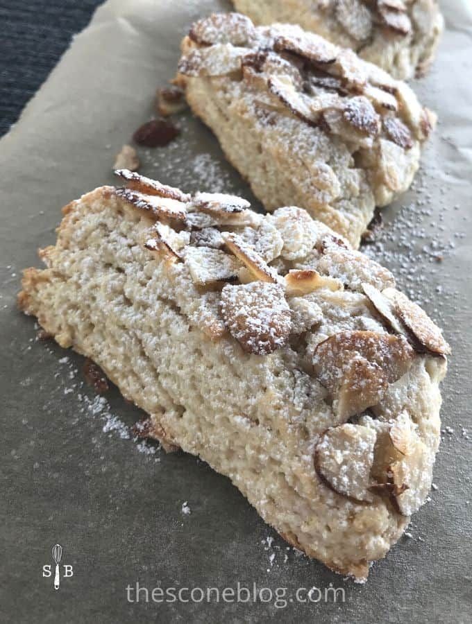 three pieces of bread with powdered sugar on top